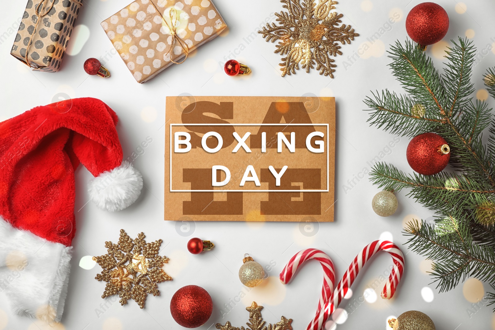 Image of Flat lay composition with text Boxing Day Sale and Christmas gifts on white background