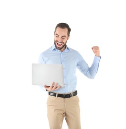 Photo of Emotional young man with laptop celebrating victory on white background