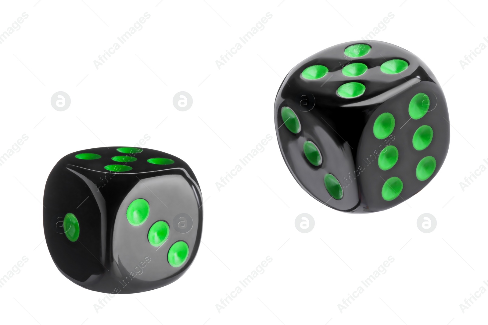 Image of Two black dice in air on white background