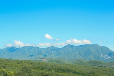 Picturesque view of beautiful mountains and blue sky