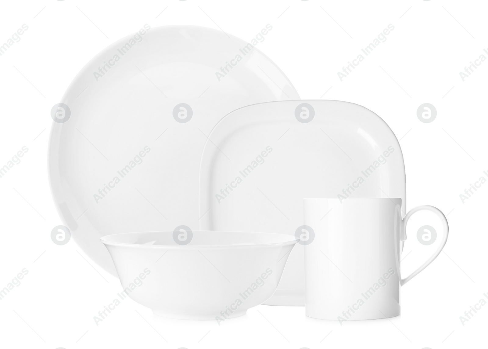 Image of Set of beautiful ceramic dinnerware on white background