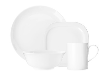 Set of beautiful ceramic dinnerware on white background