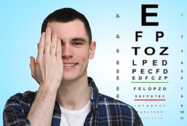 Image of Vision test. Young man and eye chart on gradient background