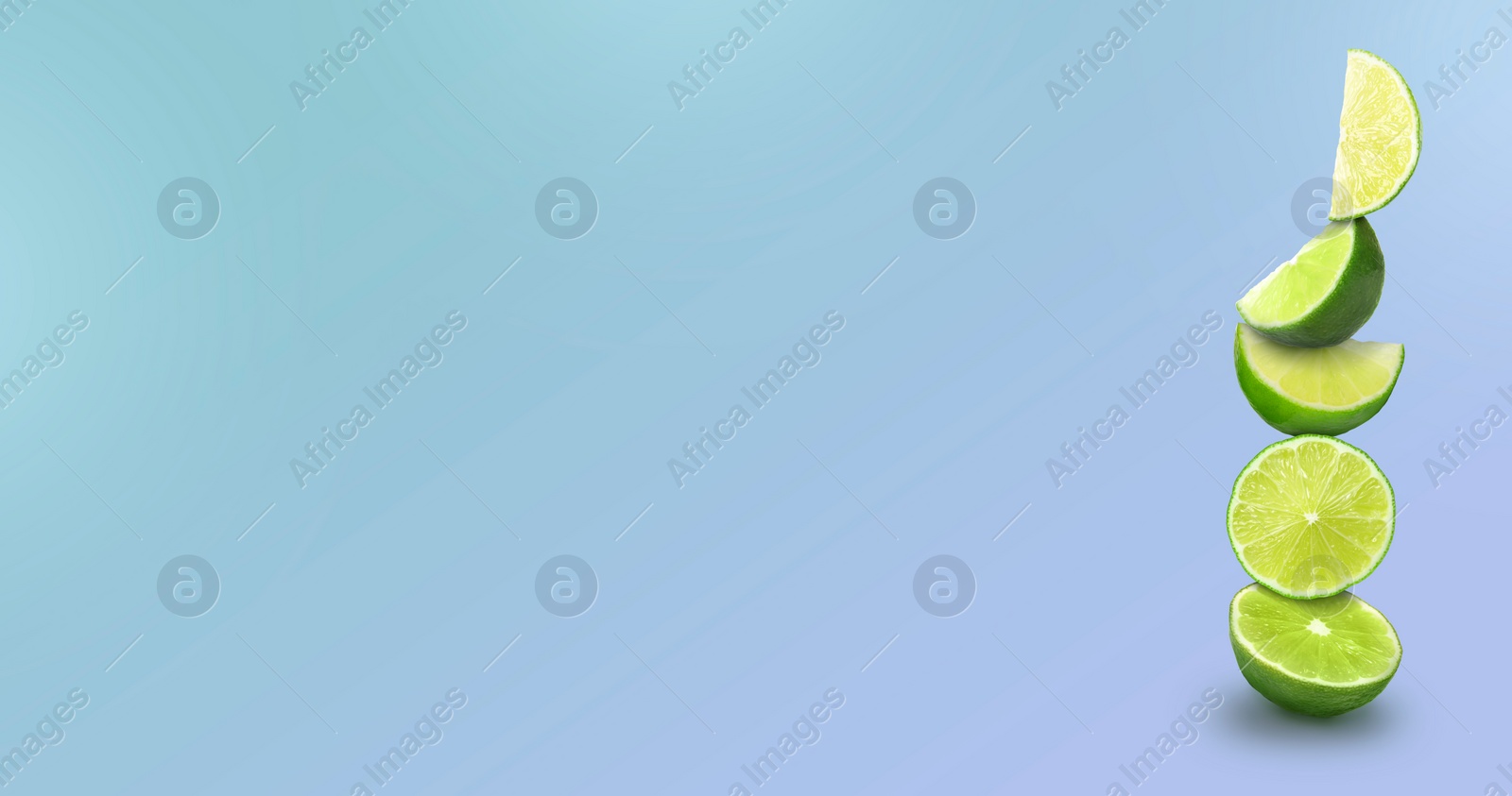 Image of Stacked cut limes on color background, space for text