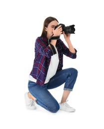 Photo of Professional photographer taking picture on white background