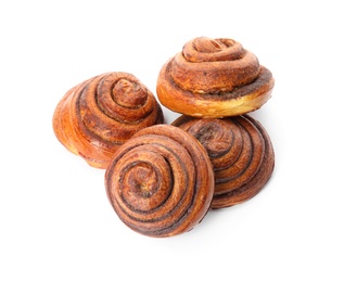Freshly baked cinnamon rolls on white background, top view