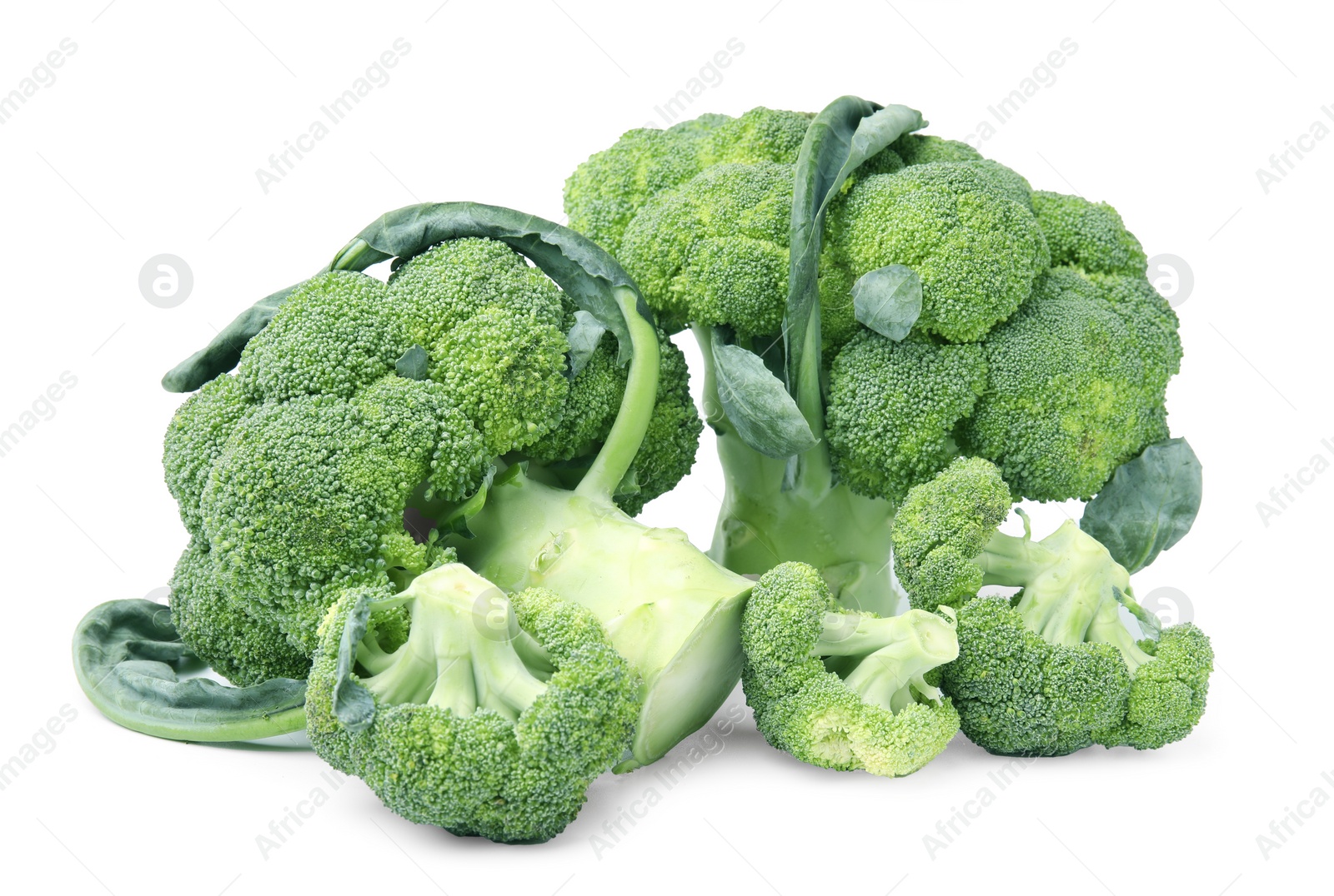 Photo of Pile of fresh raw green broccoli isolated on white