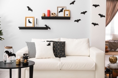 Photo of Modern room decorated for Halloween. Idea for festive interior