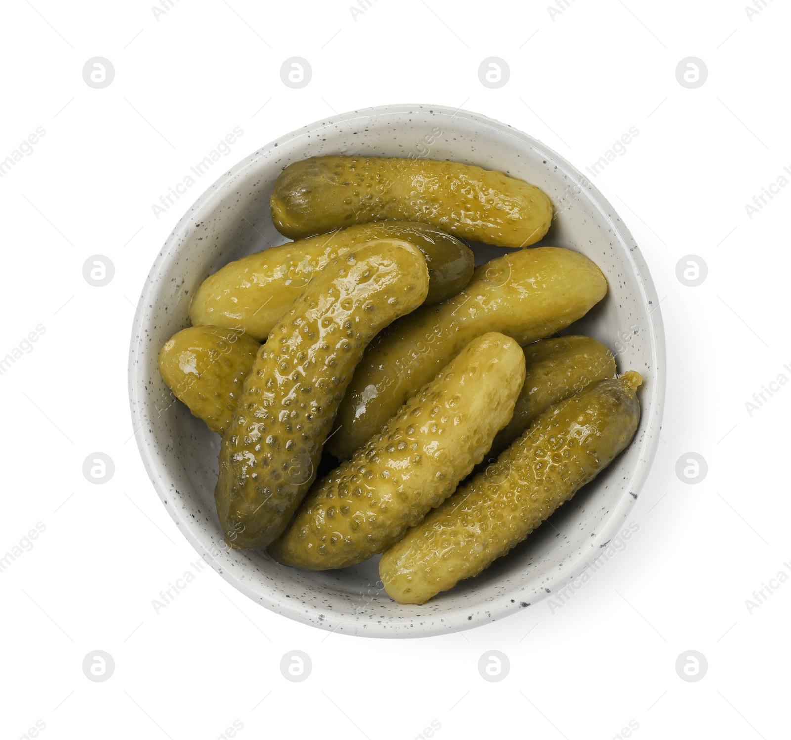 Photo of Tasty pickled cucumbers in bowl isolated on white, top view