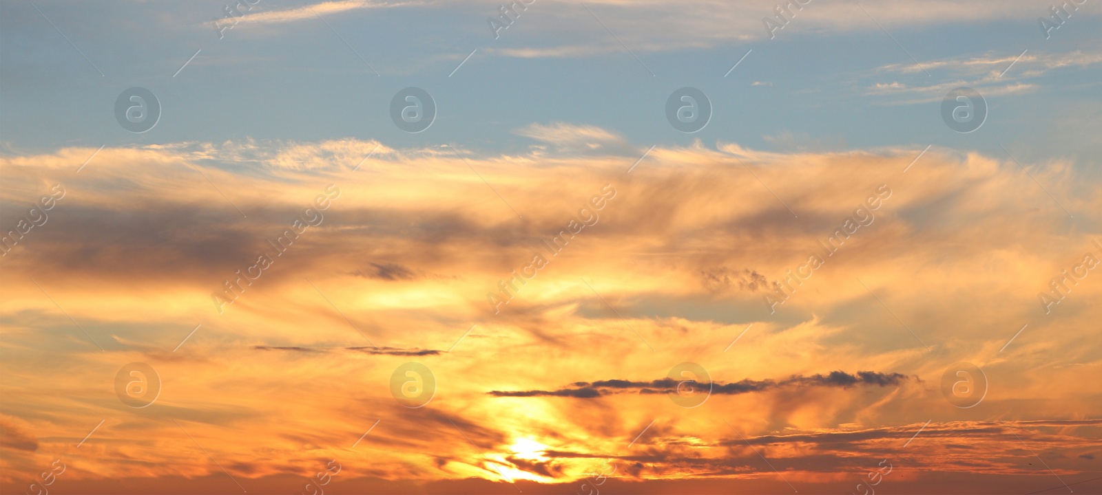 Image of Beautiful cloudy sky at sunset, banner design