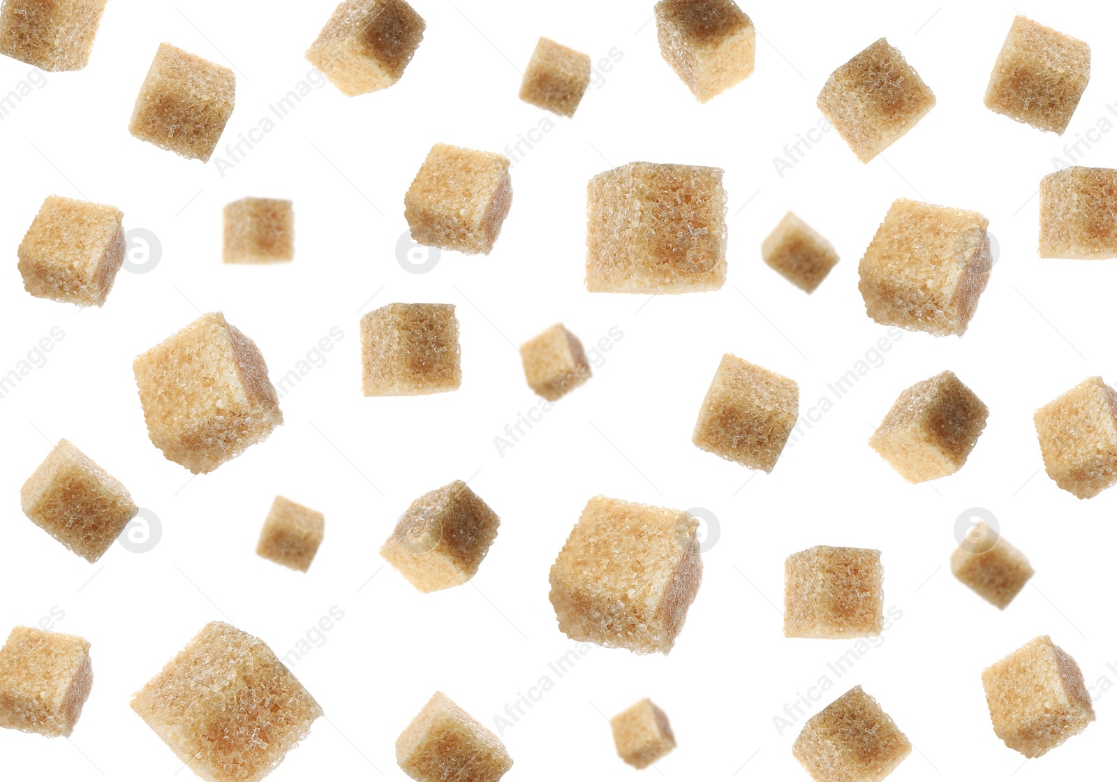 Image of Flying cubes of brown sugar on white background