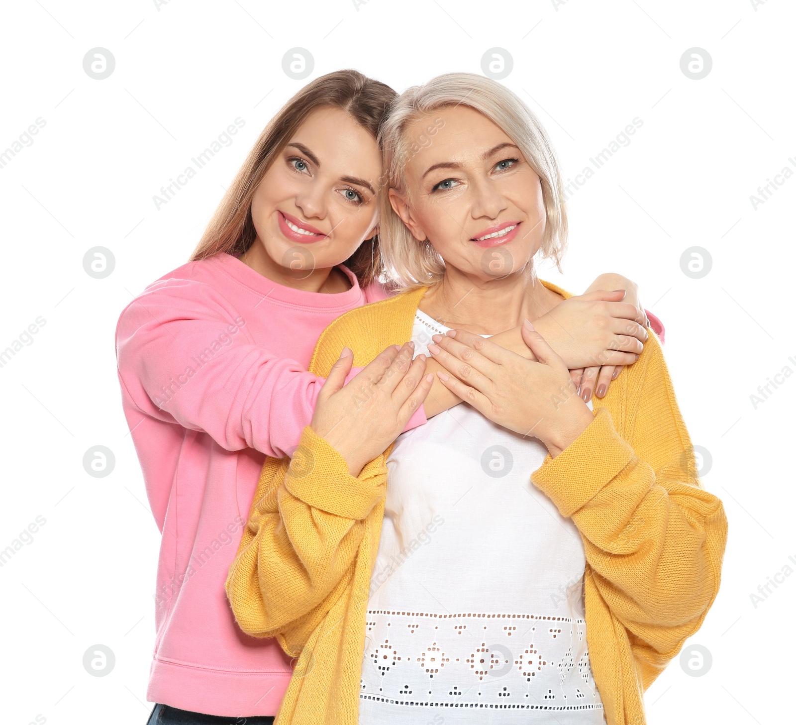 Photo of Portrait of mature woman and her daughter isolated on white