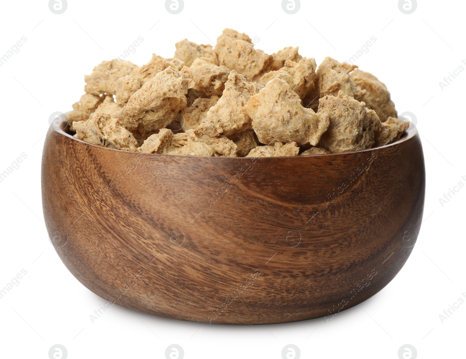 Photo of Dehydrated soy meat chunks in bowl on white background