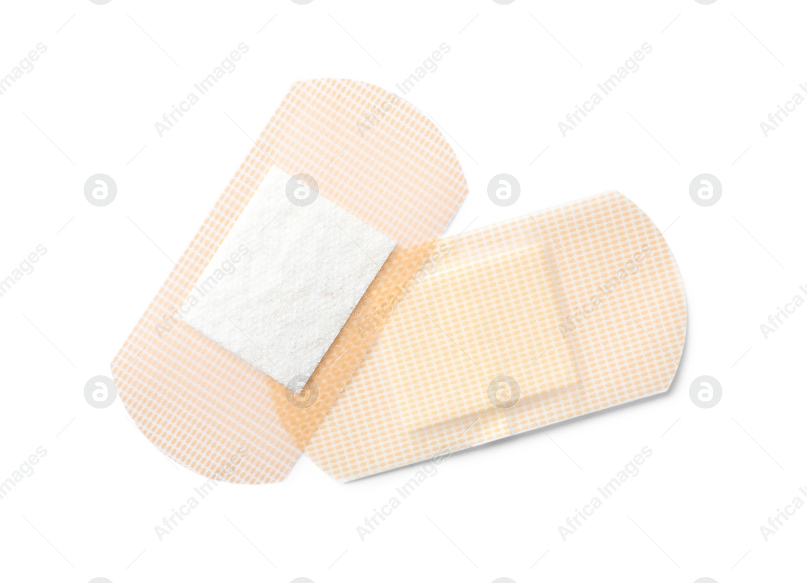 Medical sticking plasters isolated on white. First aid item Photo of Medical sticking plasters isolated on white. First aid item