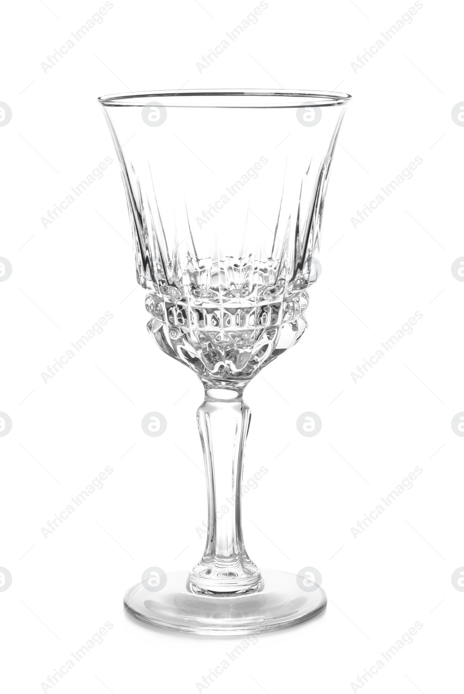 Photo of Empty clear glass for alcohol drink isolated on white