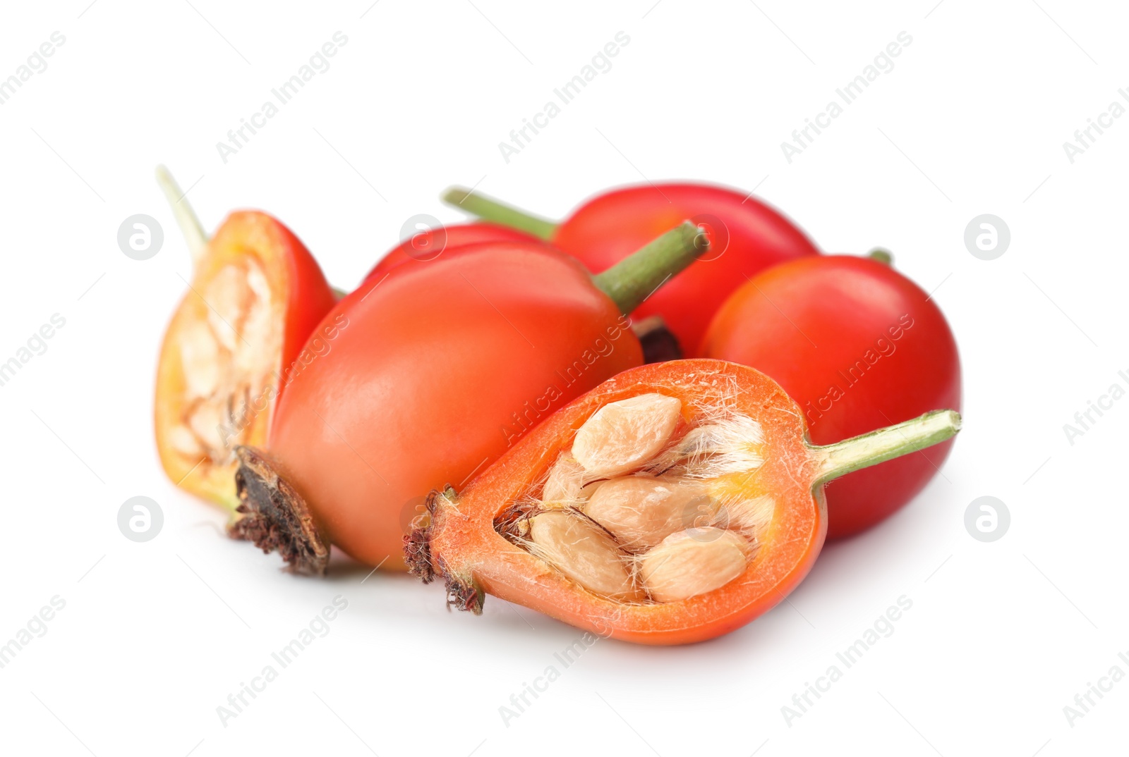 Photo of Heap of ripe rose hip berries on white background