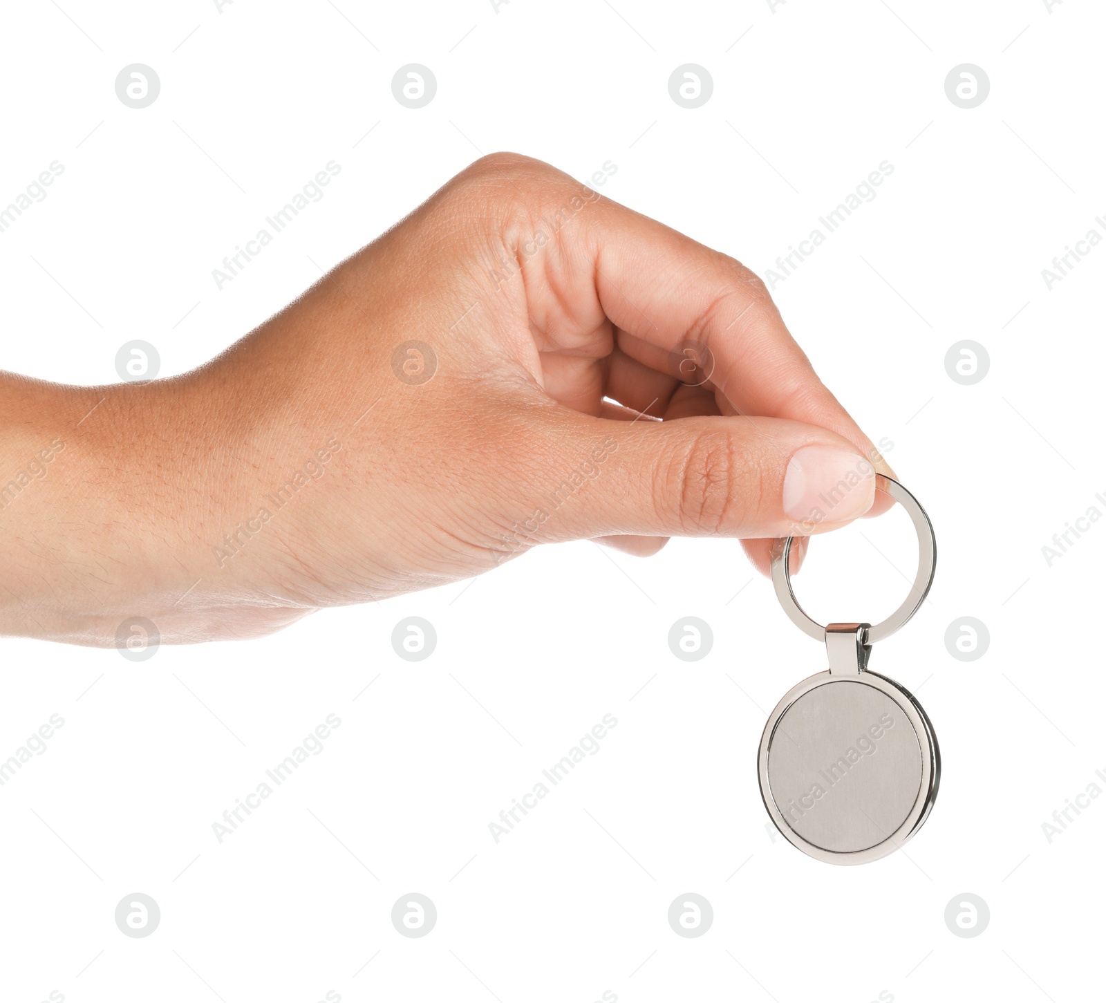 Photo of Woman holding metallic keychain on white background, closeup