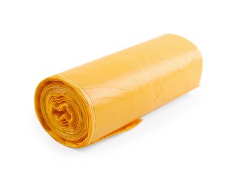 Photo of Roll of yellow garbage bags isolated on white