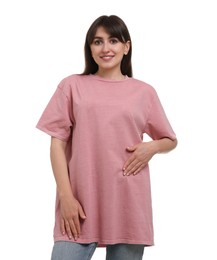 Smiling woman in stylish pink t-shirt on white background