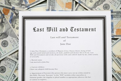 Photo of Last Will and Testament on dollar bills, top view