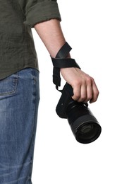 Photographer holding modern camera on white background, closeup