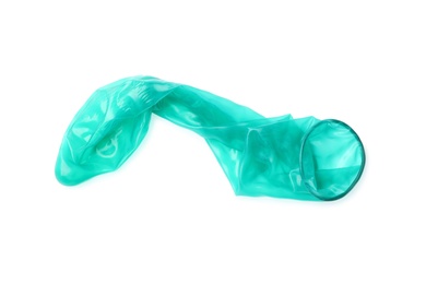 Photo of Green used condom on white background. Safe sex concept