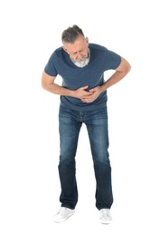 Photo of Man suffering from abdominal pain on white background