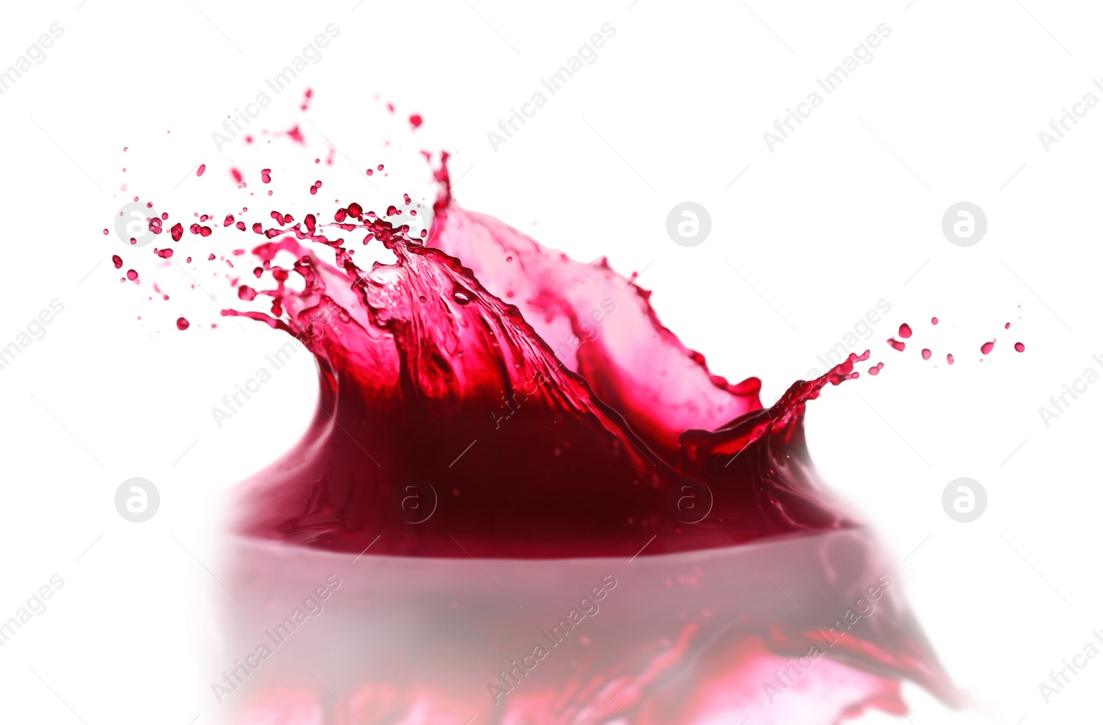 Photo of Splashing tasty fresh juice on white background