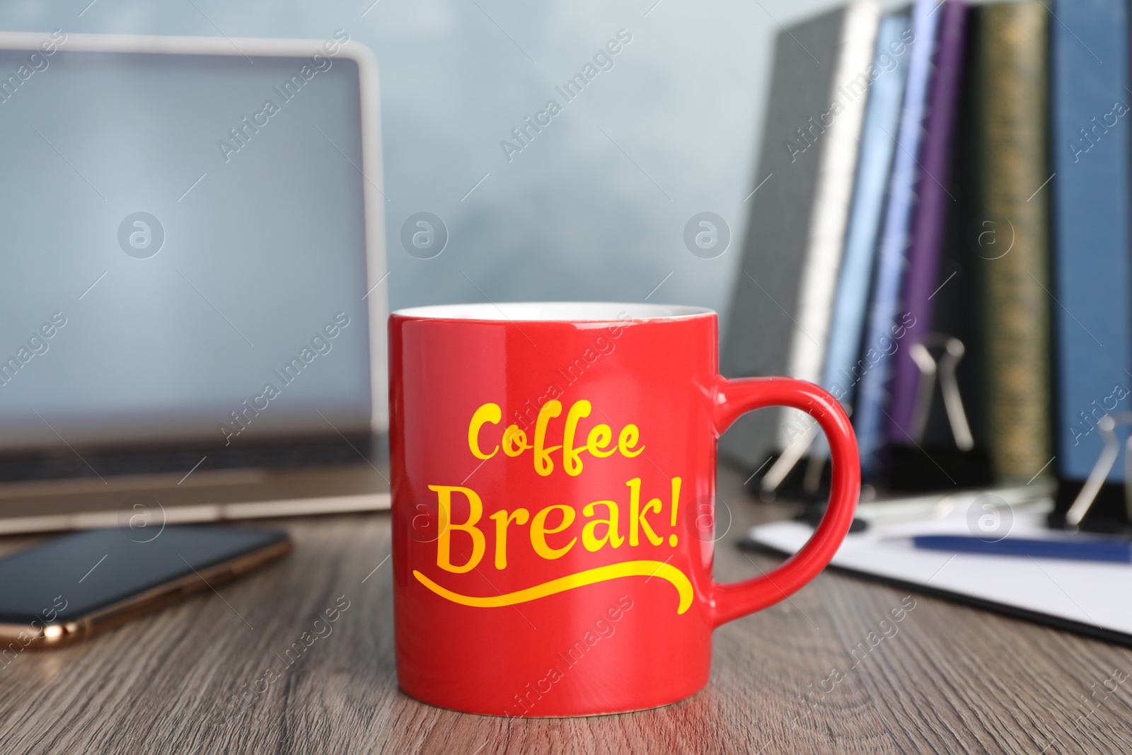 Image of Mug with inscription Coffee Break on wooden table in office