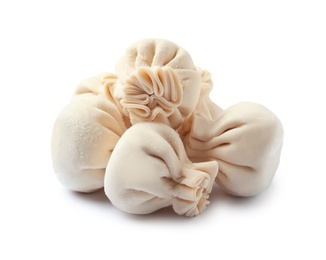 Photo of Pile of raw dumplings on white background