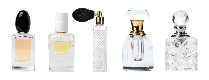 Image of Set with different bottles of perfume on white background, banner design 