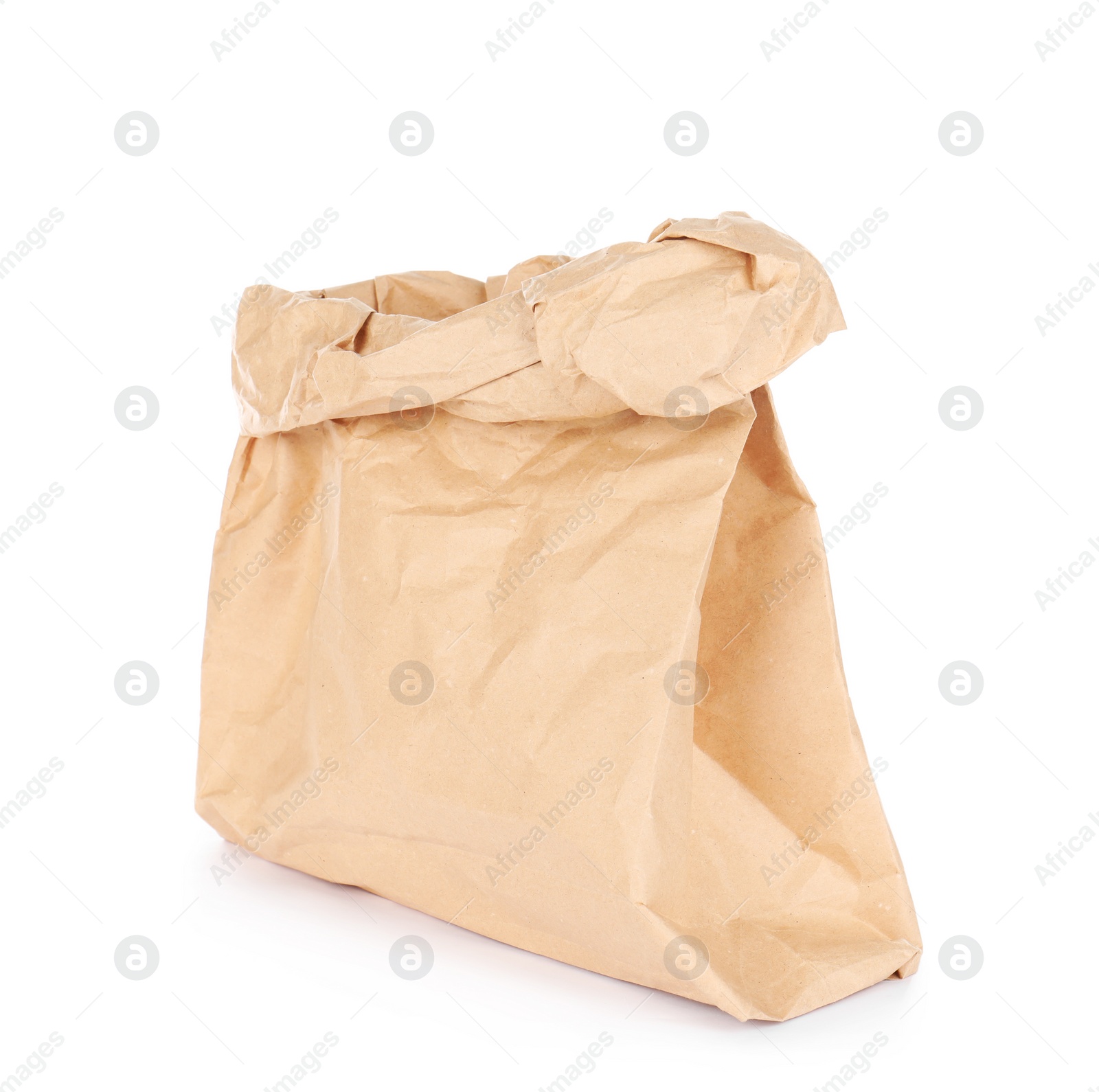 Photo of Paper bag isolated on white. Mockup for design