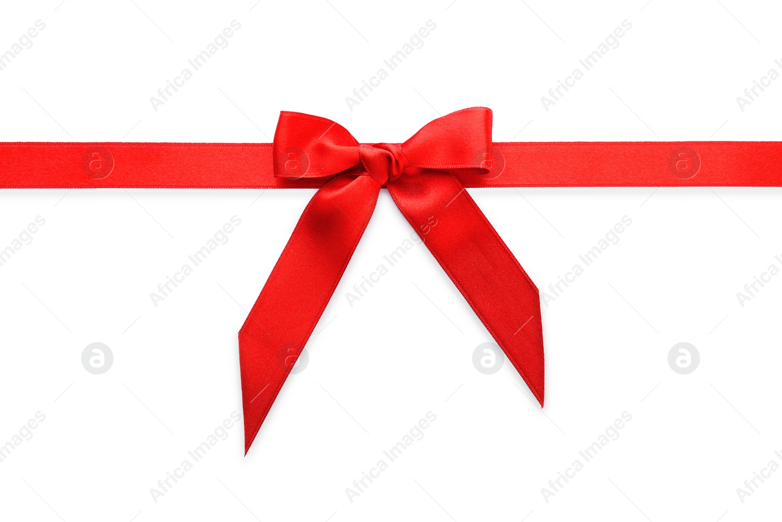 Photo of Red ribbon with bow on white background, top view