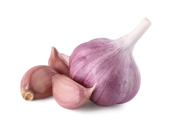 Photo of Fresh raw garlic head and cloves isolated on white