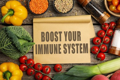 Boost your immune system with proper diet. Different foods on wooden table, flat lay