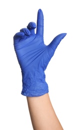 Woman in blue latex gloves holding something on white background, closeup of hand