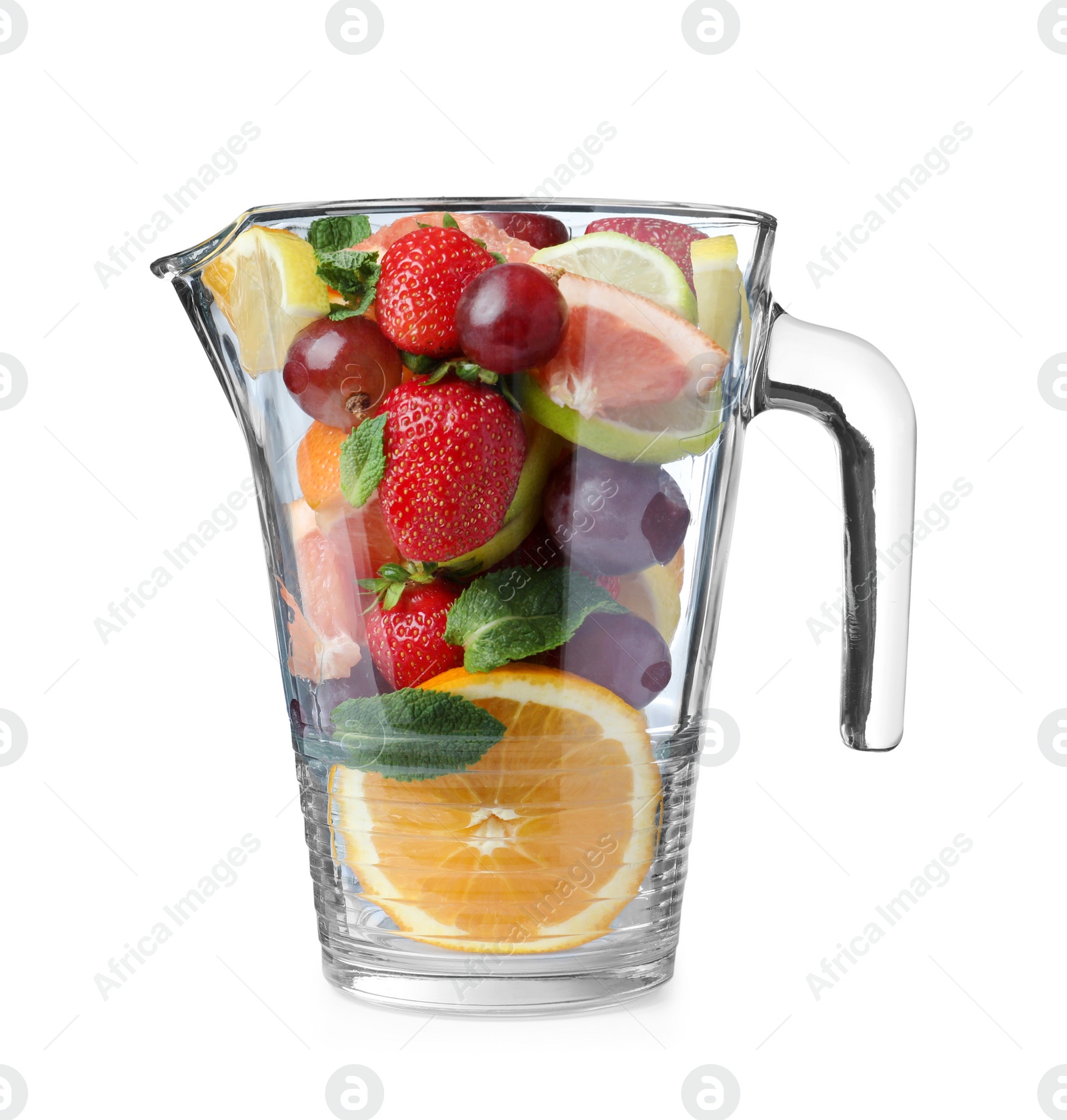 Photo of Glass jug with different whole and cut fruits on white background