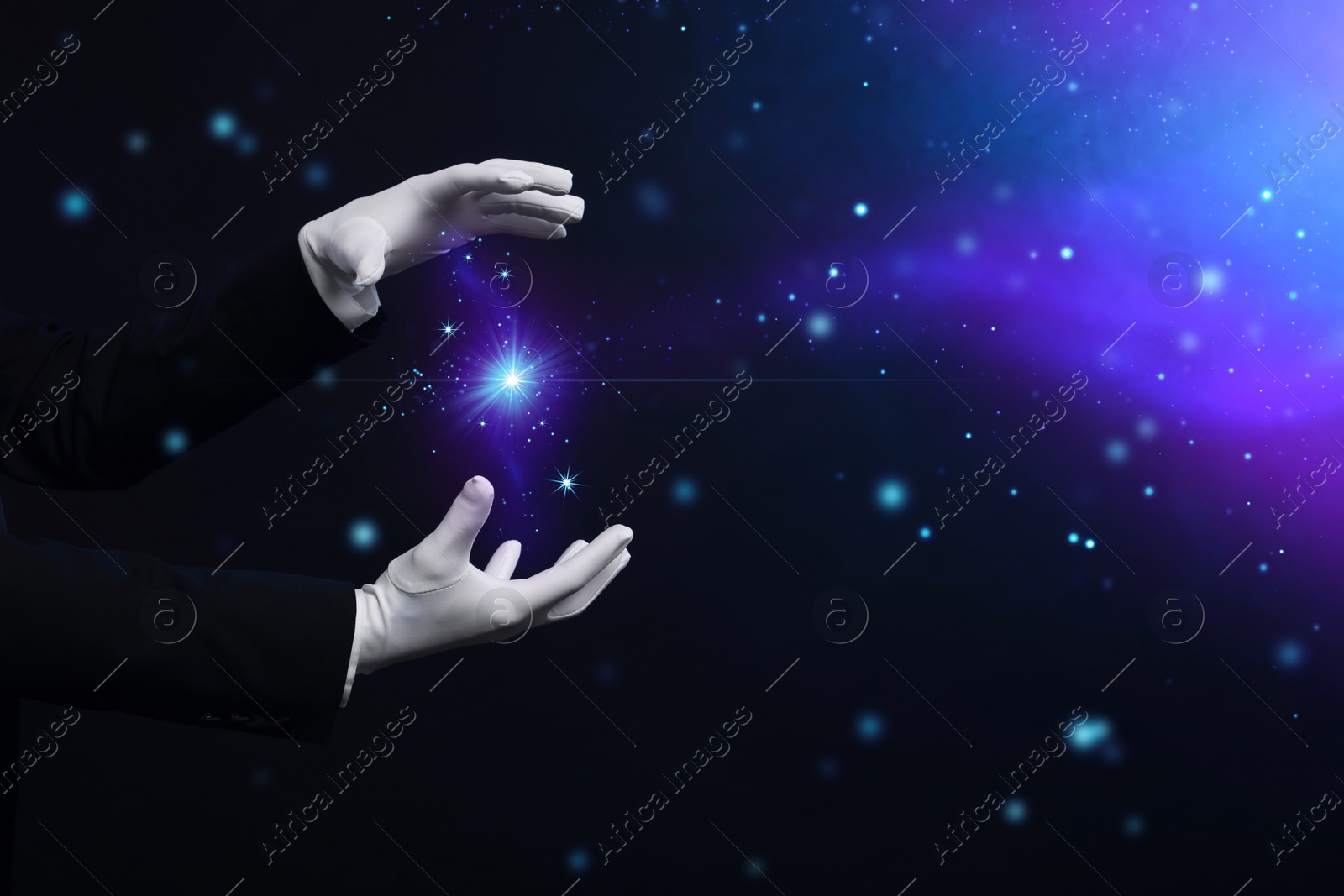 Image of Magician in gloves showing trick on dark background, closeup. Space for text