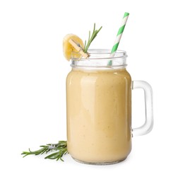 Photo of Mason jar of tasty banana smoothie with straw on white background
