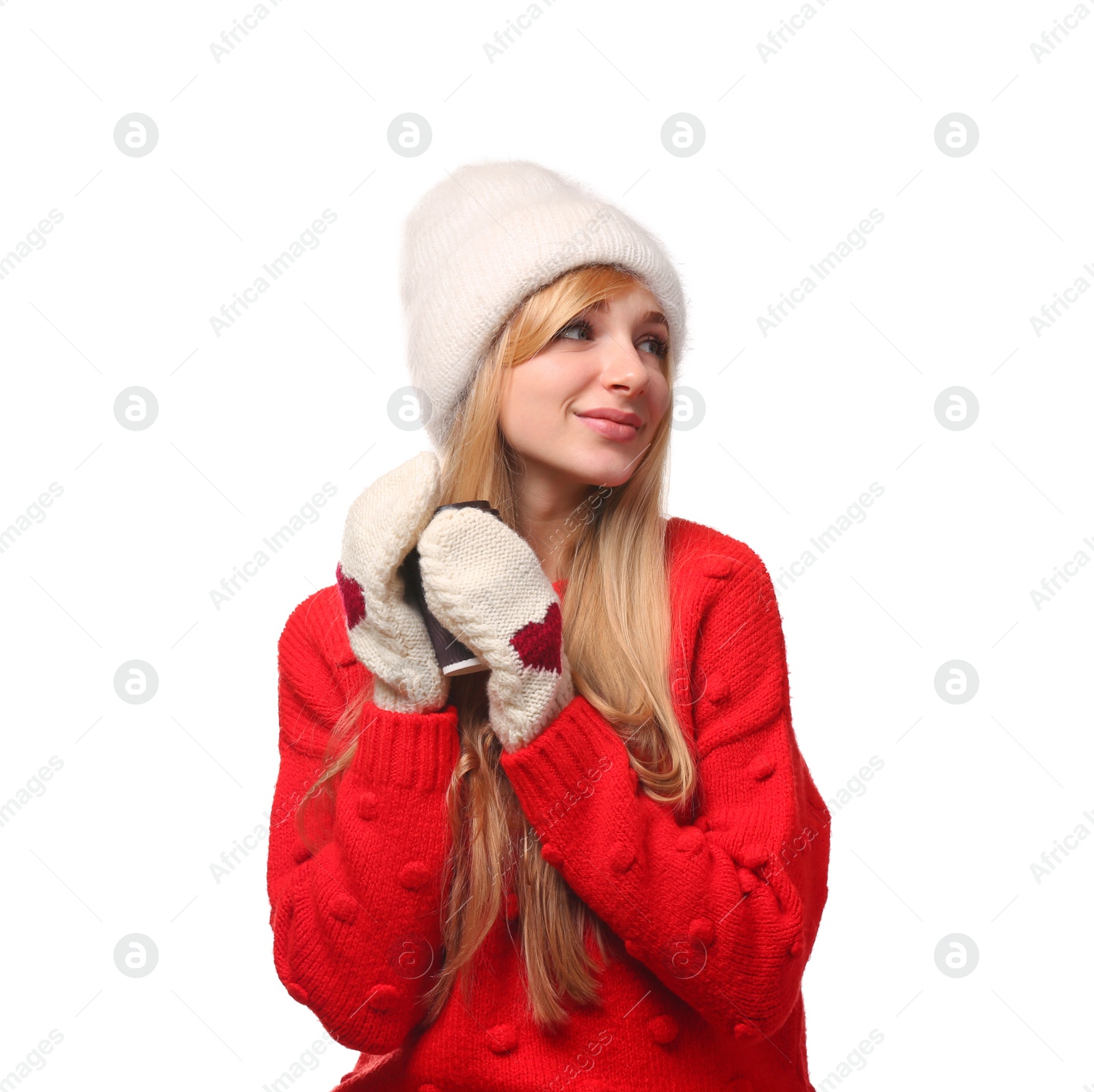 Photo of Portrait of young woman in stylish hat and sweater with paper coffee cup on white background. Winter atmosphere