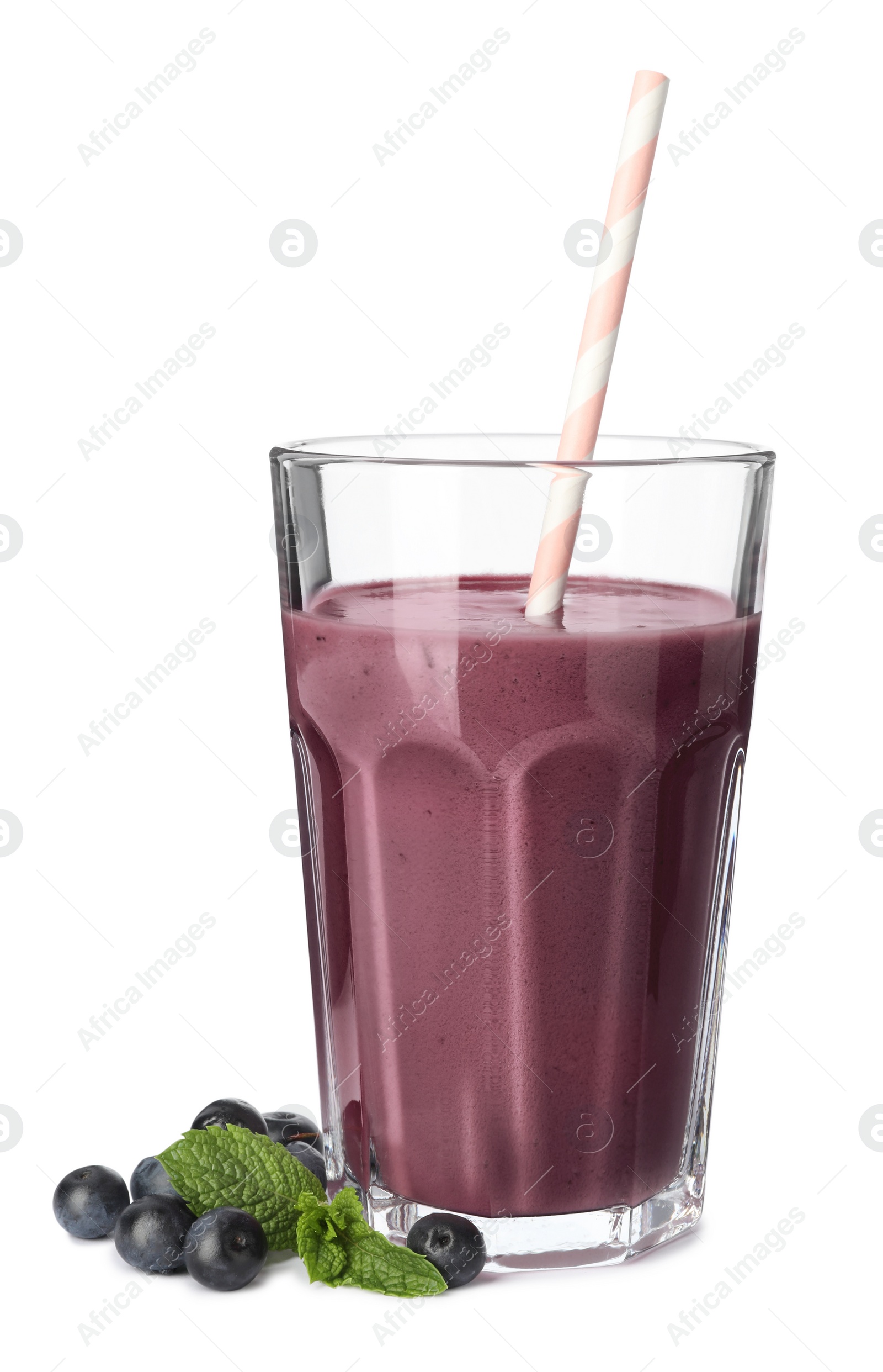 Photo of Glass of acai drink with berries on white background