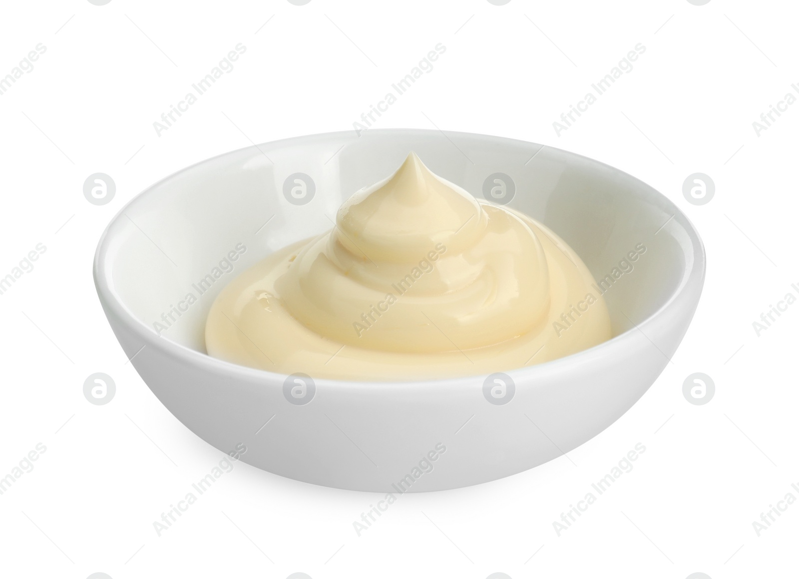 Photo of Fresh mayonnaise sauce in bowl isolated on white