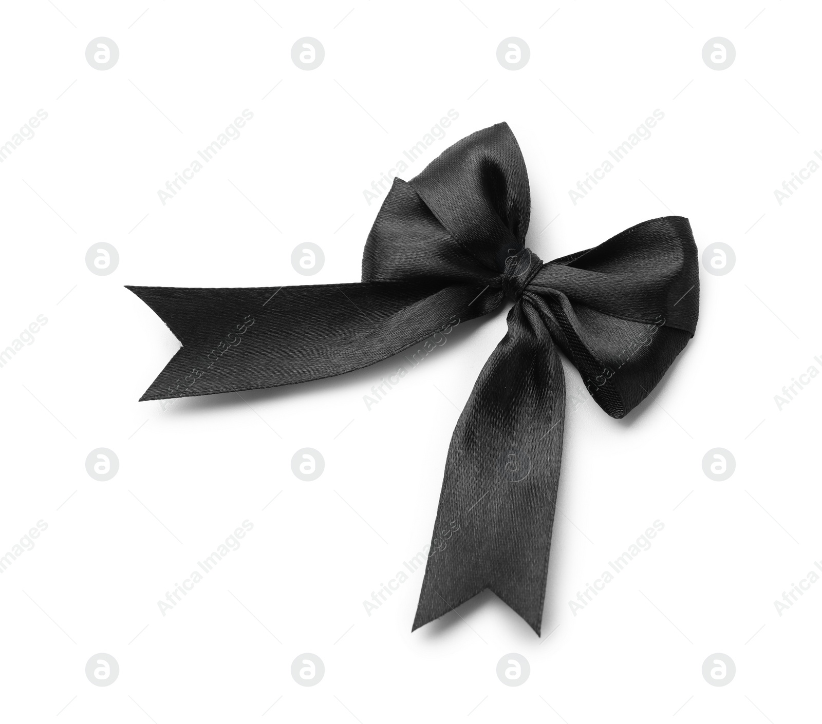 Photo of Black satin ribbon bow isolated on white, top view