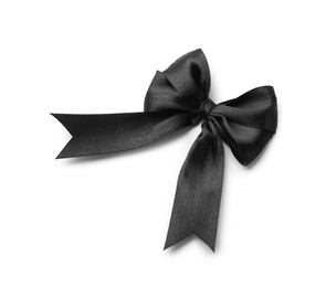 Photo of Black satin ribbon bow isolated on white, top view