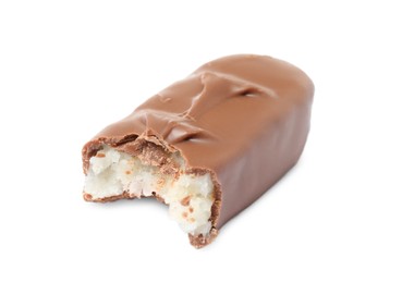Photo of Delicious milk chocolate candy bar with coconut filling isolated on white
