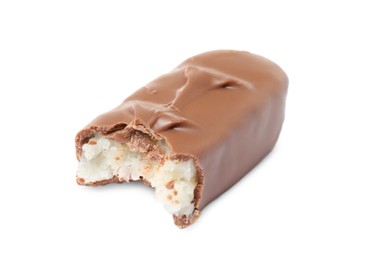 Delicious milk chocolate candy bar with coconut filling isolated on white