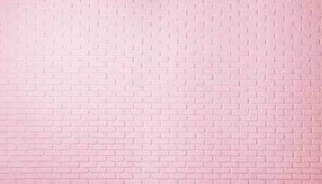 Image of Texture of pink color brick wall as background