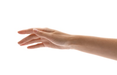 Young woman holding her hand on white background, closeup