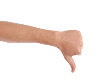 Photo of Man showing thumb down gesture on white background, closeup of hand