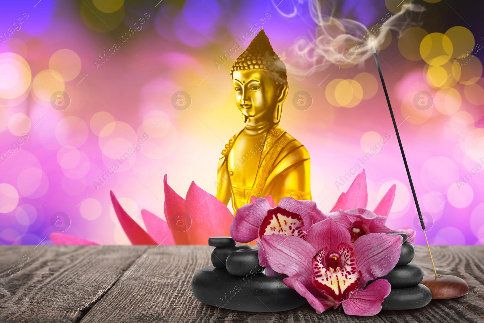 Image of Composition with smoldering incense stick on wooden table and Buddha figure on background. Space for text